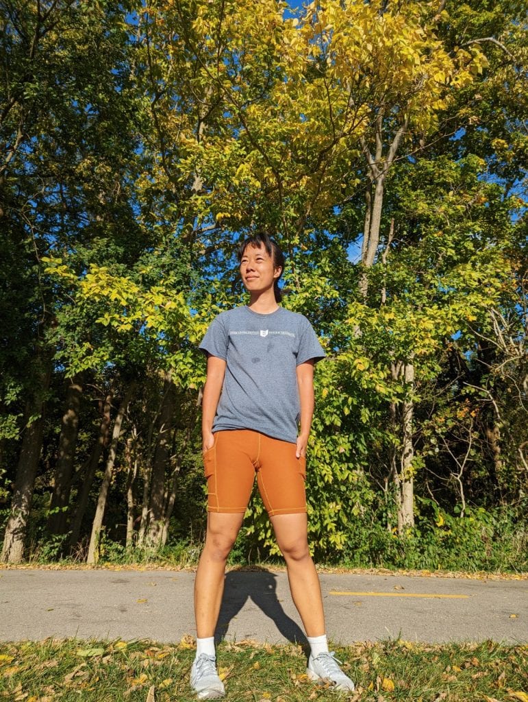 Me wearing the Wolven turmeric pocket bike shorts after a run
