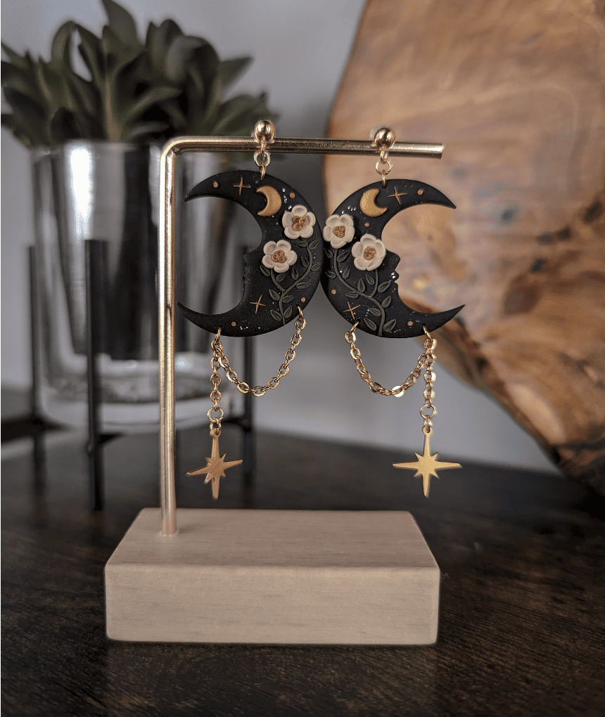 Dark moon earrings with flowers and gems
