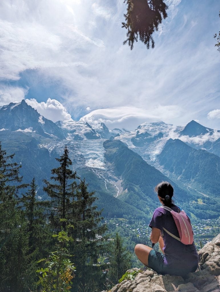 Me sitting on the rocks looking out at the Bossons mountain range