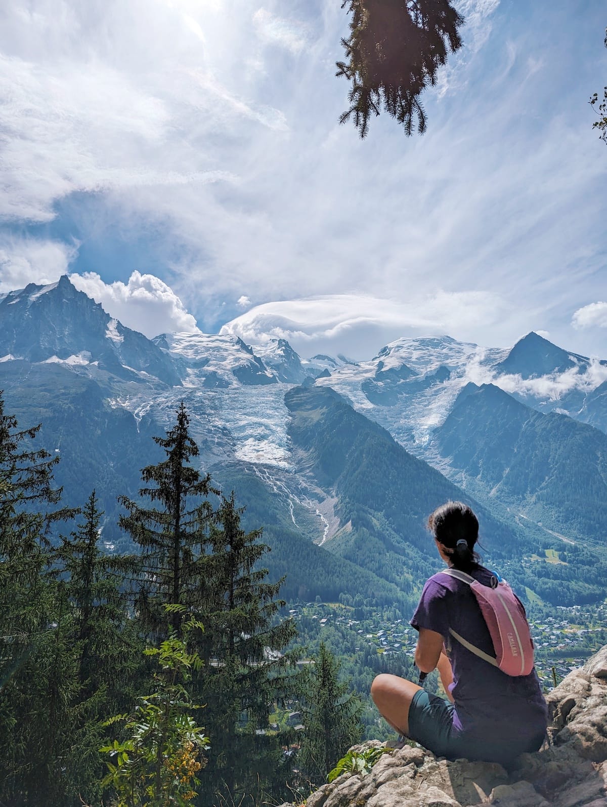 Me sitting on the rocks looking out at the Bossons mountain range