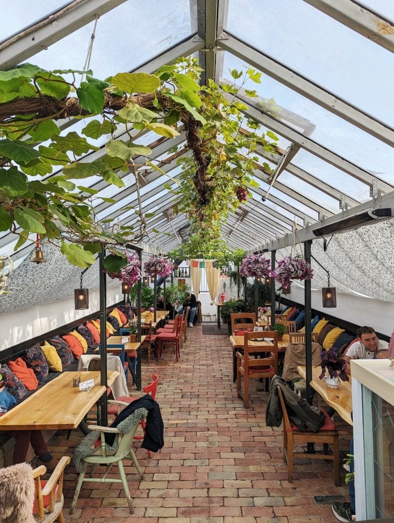 Cute cafe in a greenhouse in Slottstradgarden
