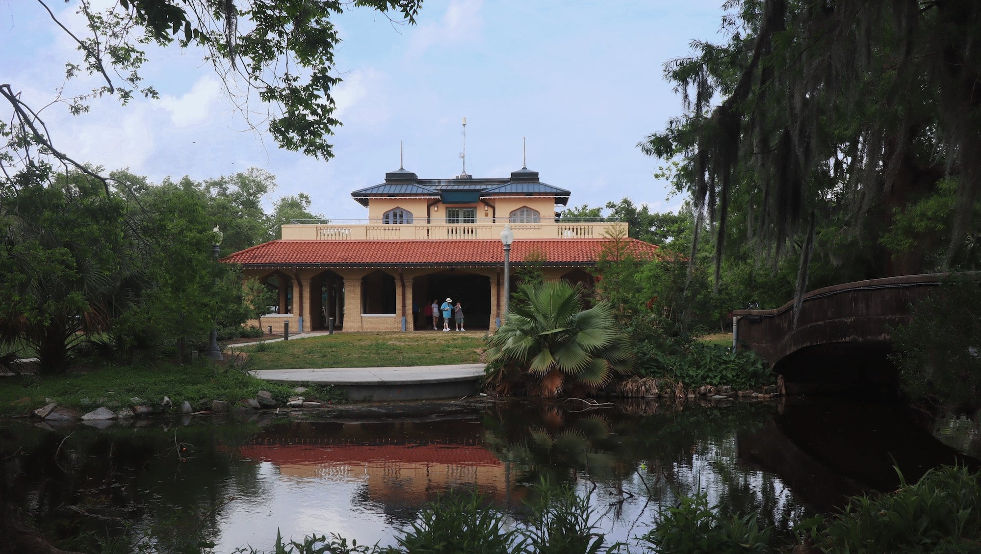 View of Cafe du Monde in City Park across from the creek