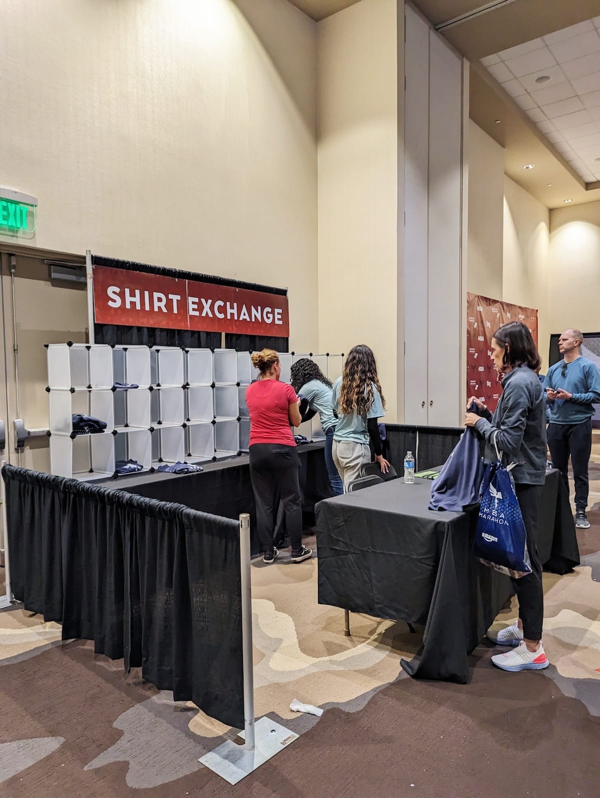 Shirt exchange stand at the Mesa Marathon expo