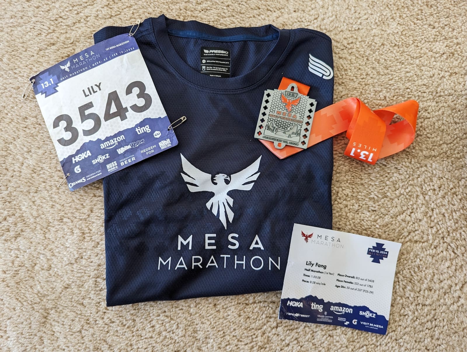 Mesa Half Marathon shirt, medal, and bib