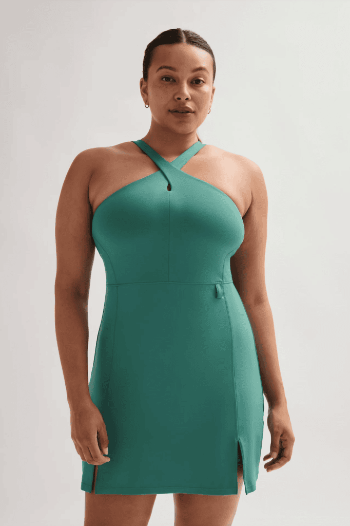 Woman wearing a green halter dress