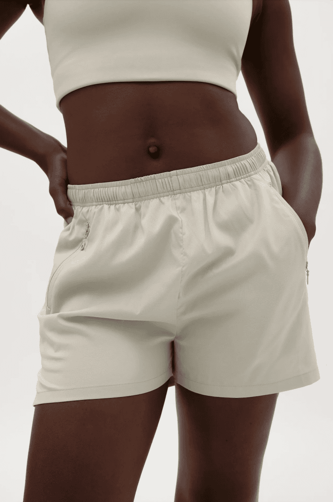 Black woman wearing gray shorts