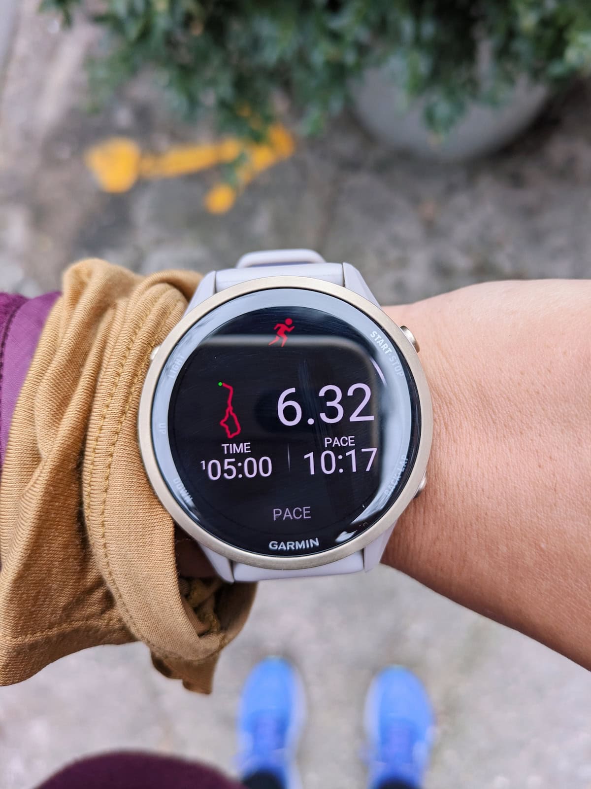 Forerunner 970 on my wrist with run summary stats