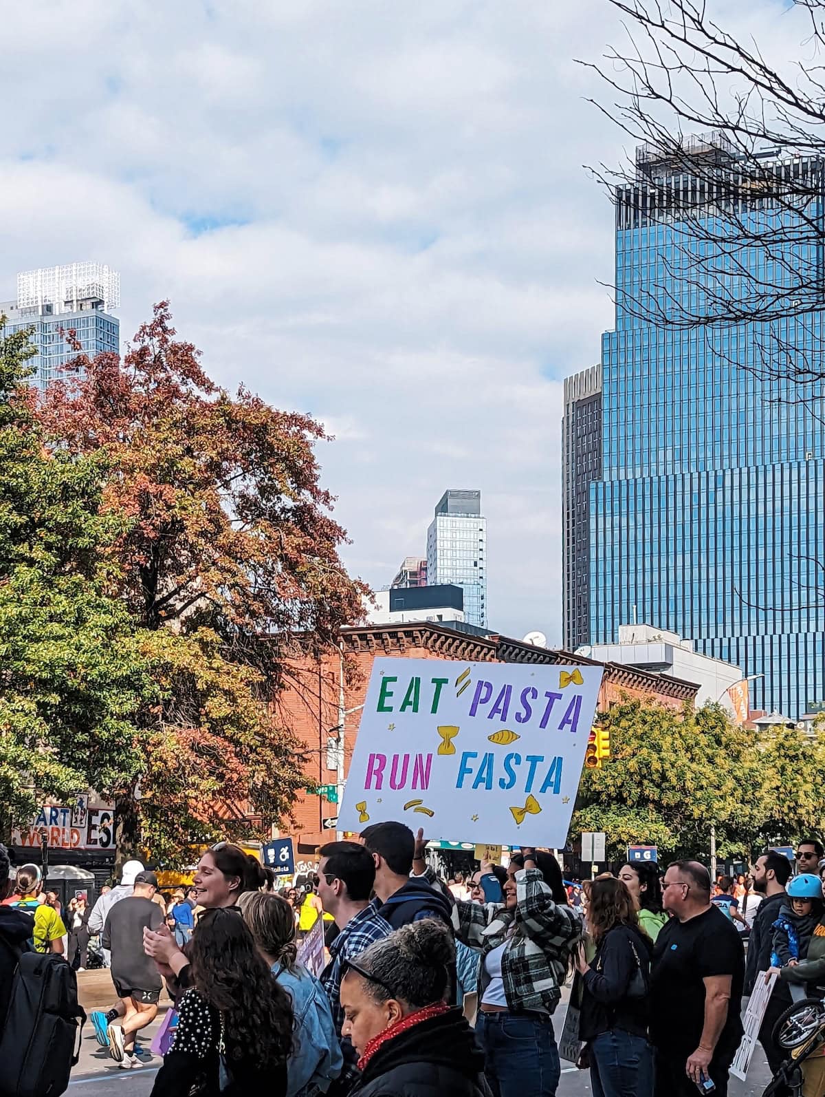 Marathon poster that says "eat pasta run fasta"