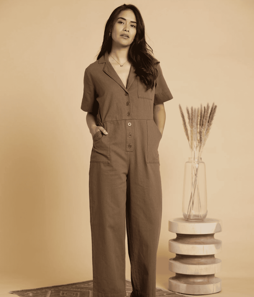 Woman wearing a brown Known Supply jumpsuit