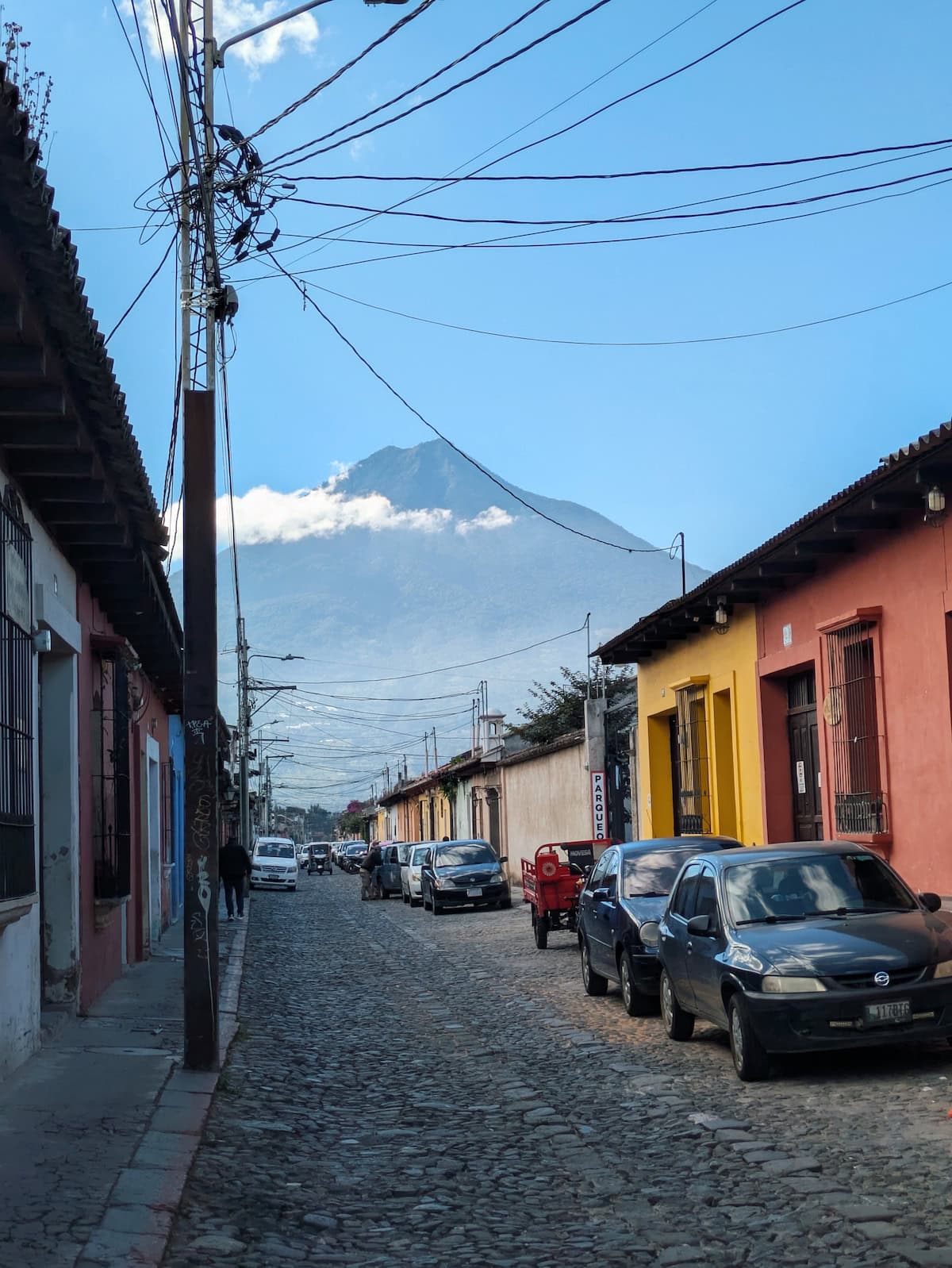 View of Agua Volcano from a colorful street in Antigua