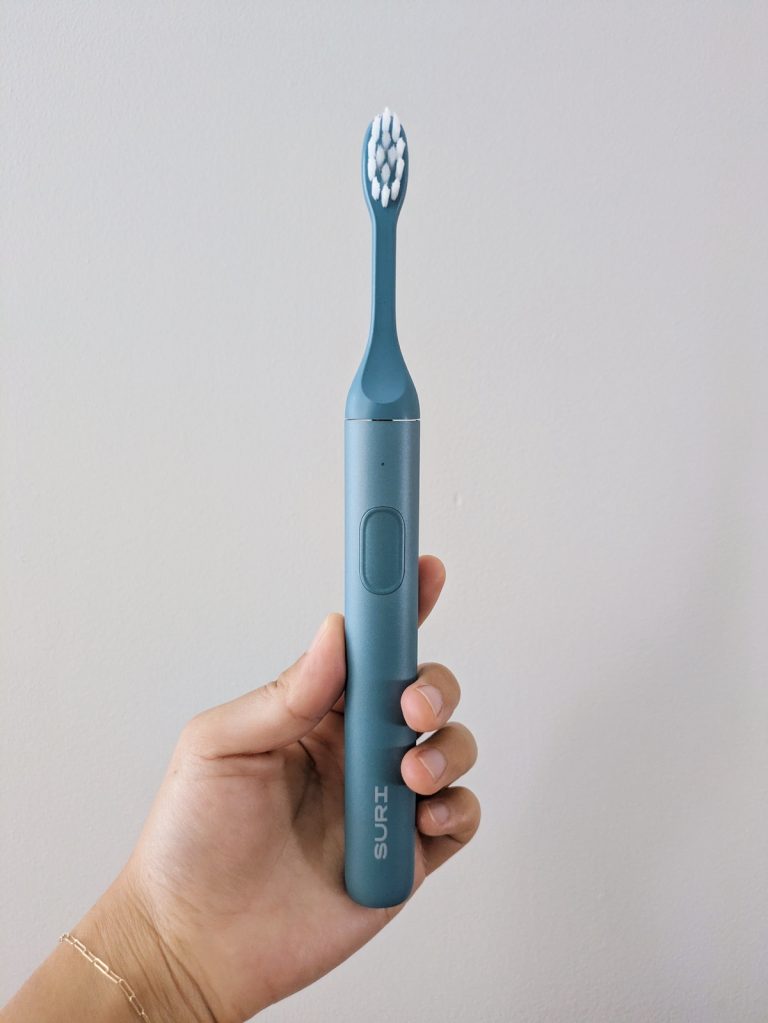 Holding the SURI 2.0 in blue in my hand