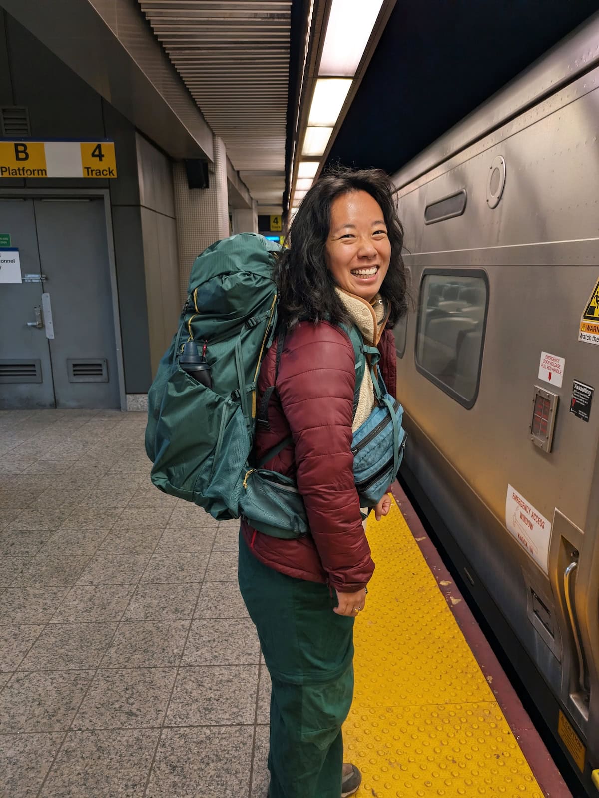 Me in the train station with the REI Flash 55 Pack on my back