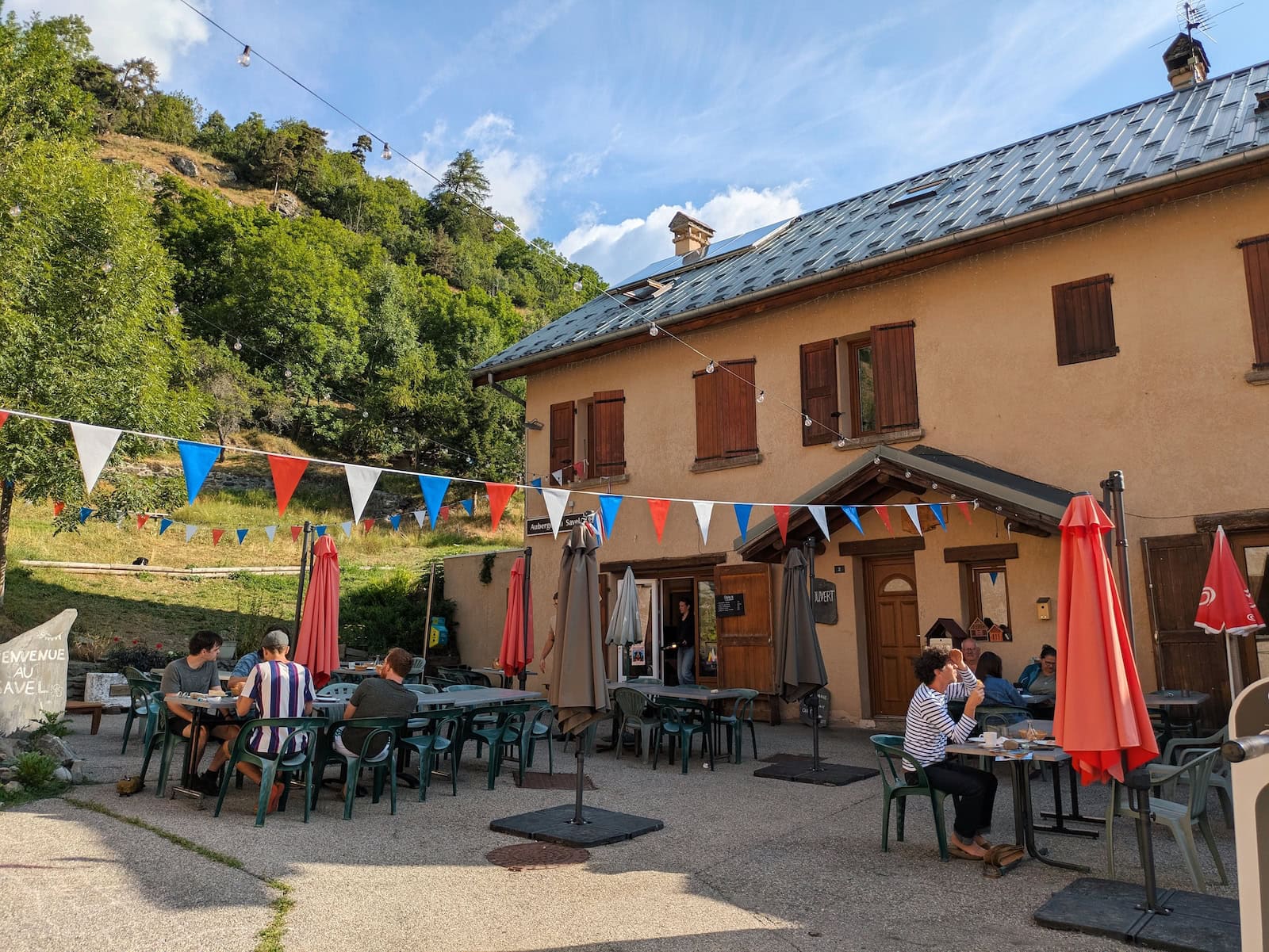 View of Auberge du Savel from the outside on a sunny day