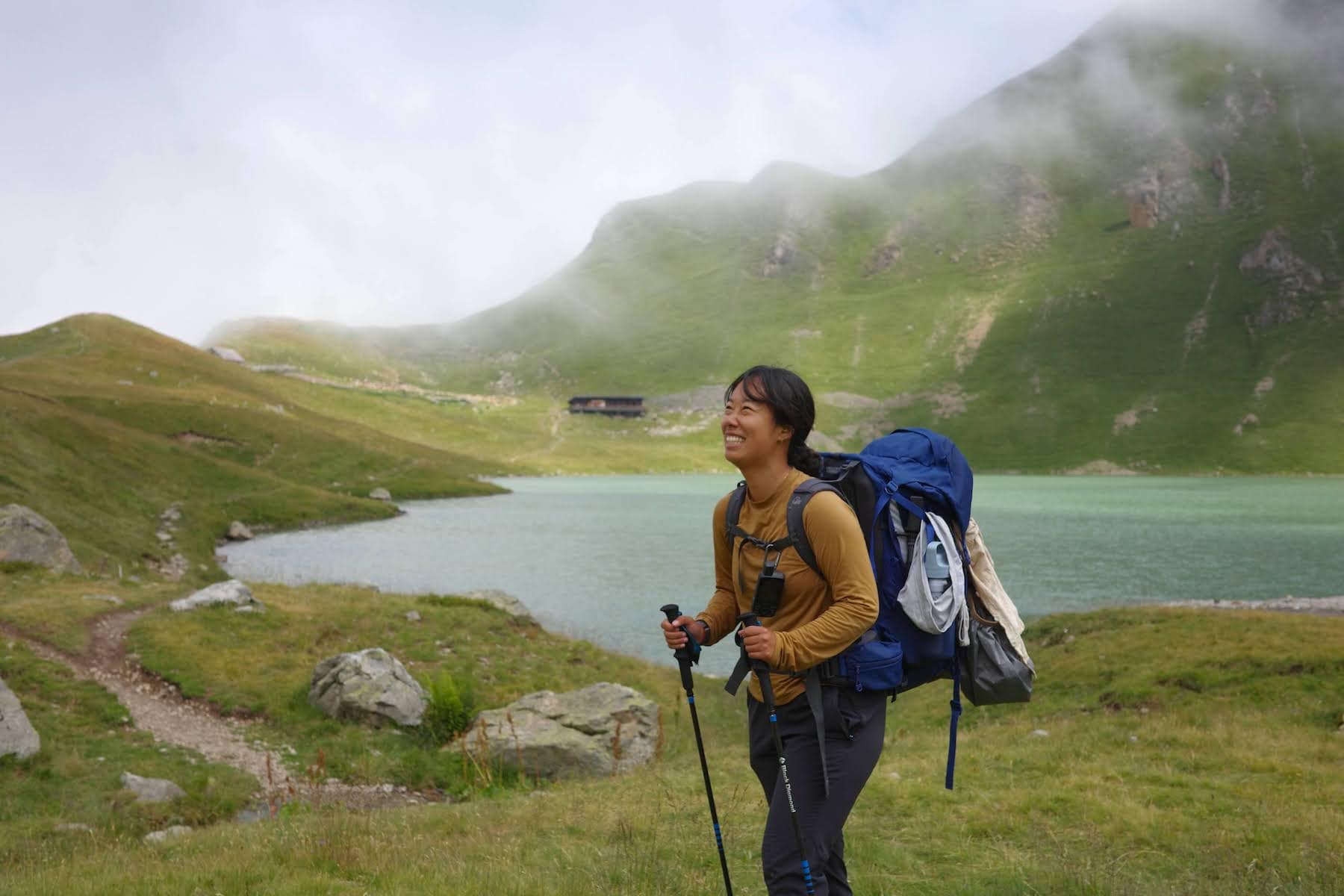 Me posing in front of a misty Lac de la Muzelle