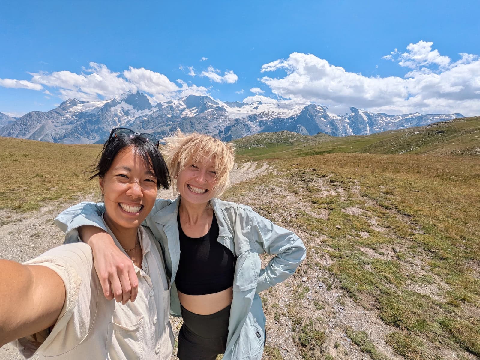 Me and my friend on Day 2 of the GR54 taking a selfie in front of glaciers