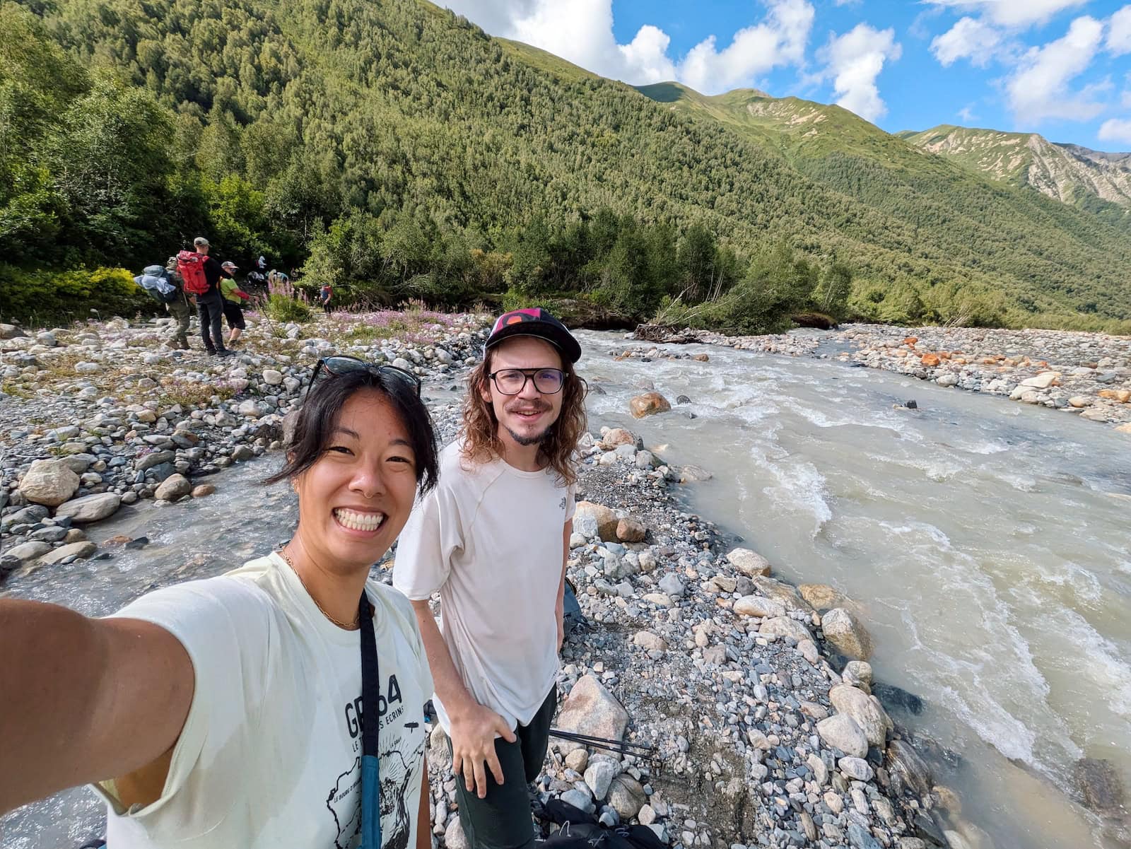 Selfie of my friend and I after crossing the river on the Mestia to Ushguli Trek
