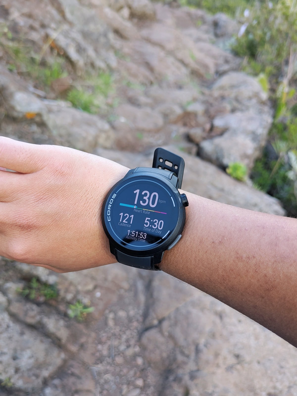 Photo of the PACE Pro during a trail run