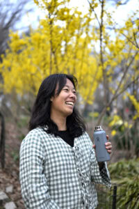 Photo of me holding a Hydro Flask bottle
