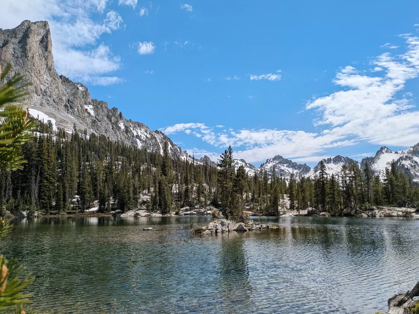 Alice Lake, Idaho with snow-capped mountains in the background